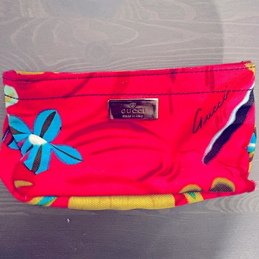 Gucci pink floral cosmetic bag. Excellent condition.